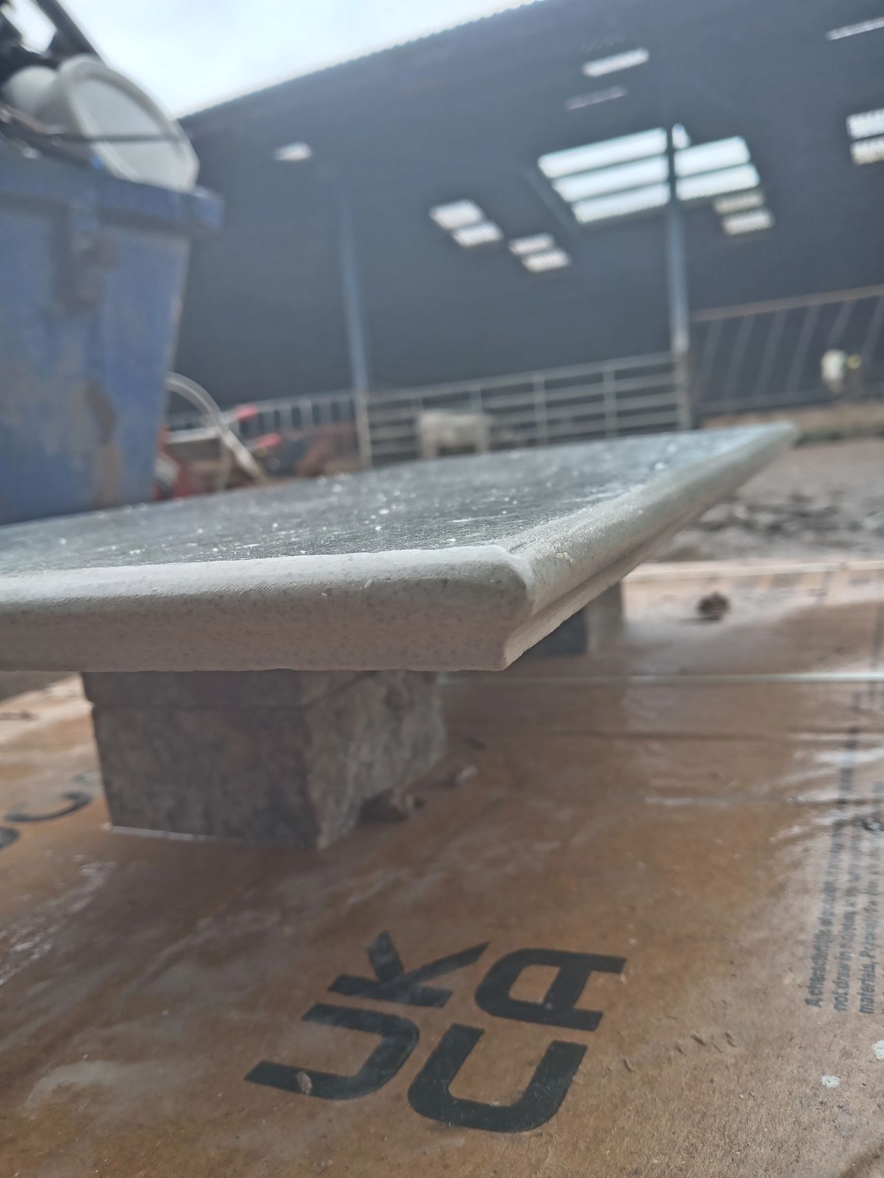A 20mm full-bodied porcelain coping with a full bullnose edge