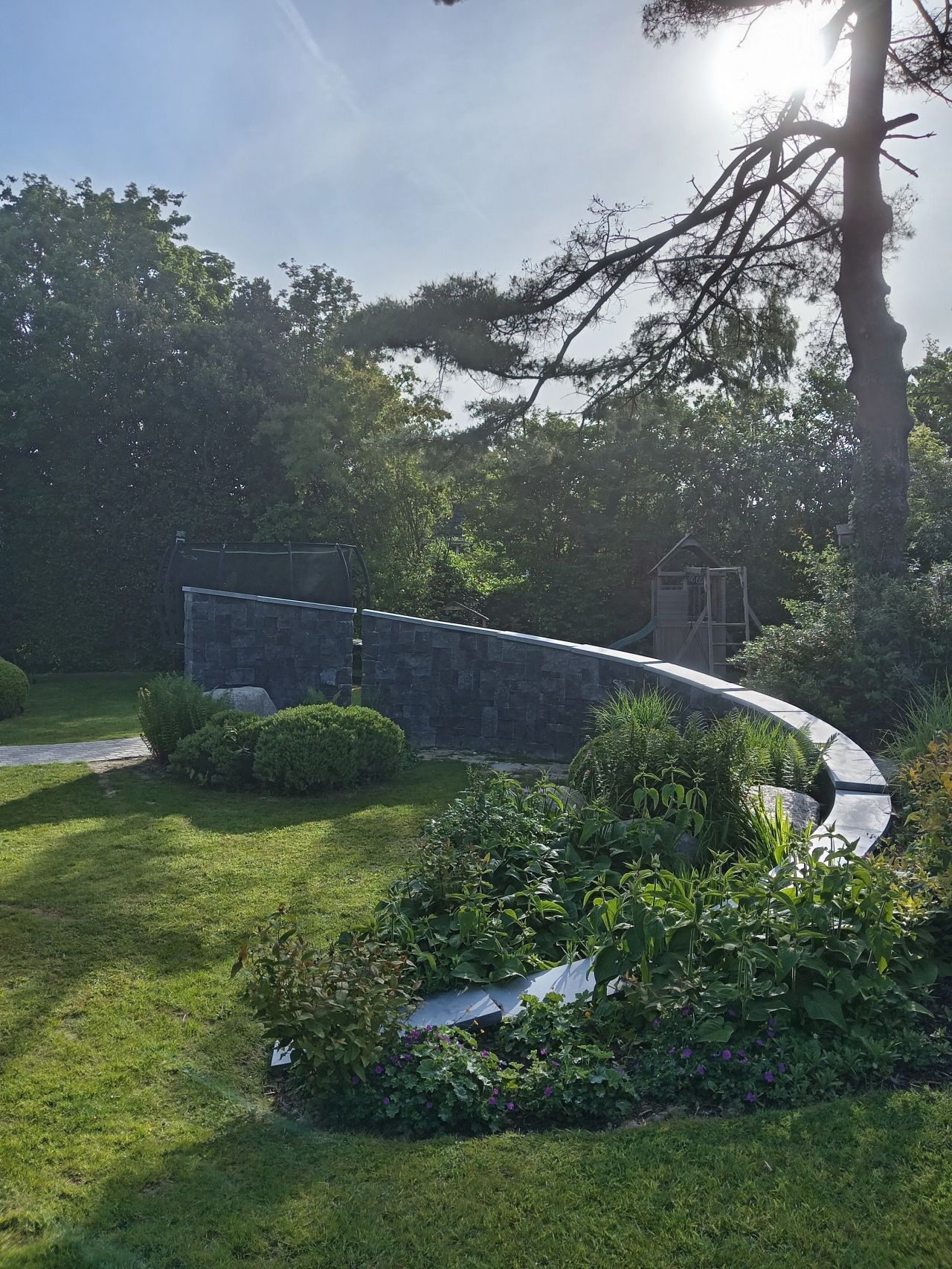 Curved 50mm Kilkenny limestone wall caps profiled to match the wall