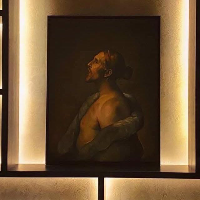 Backlit large-format stone feature wall used as artwork