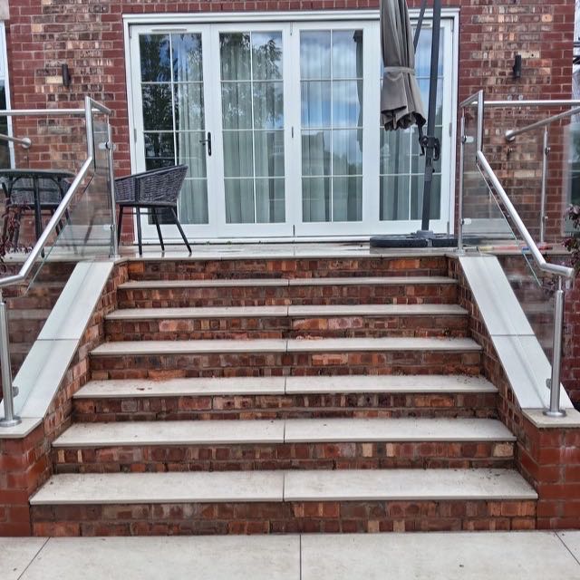 Garden steps with a glass balustrade, front view
