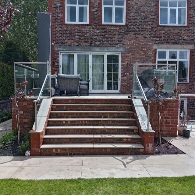 Garden steps with a glass balustrade, full view