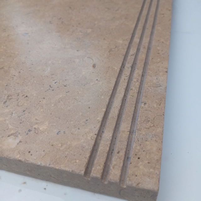 Limestone coping with anti-slip grip grooves