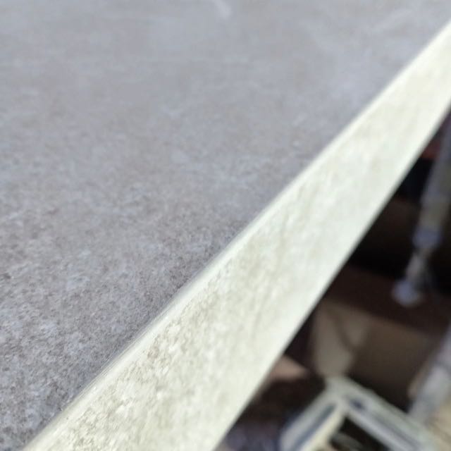 Close-up of a hand-finished porcelain bullnose edge