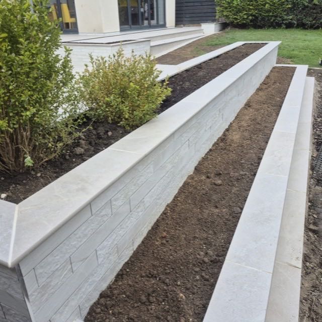 Porcelain-capped raised garden beds