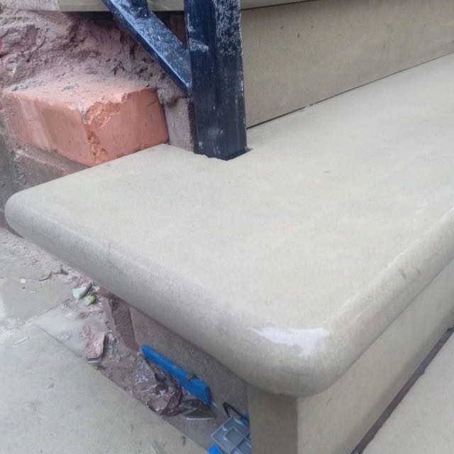 Sandstone step tread with a bullnosed front edge