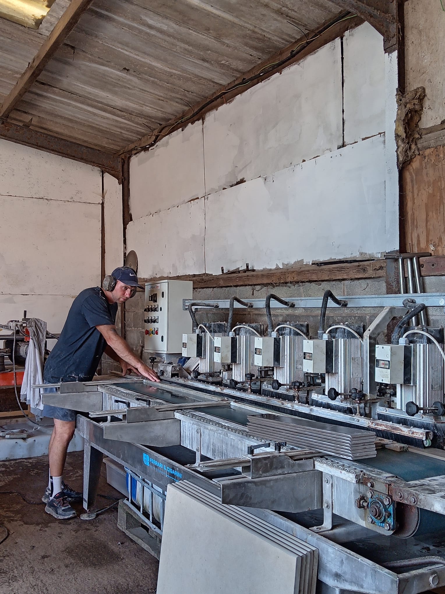 Dan profiling porcelain on the bullnose machine in the Acton Bridge workshop